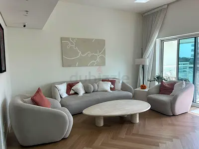 URGENT: Light grey curved 3-seater sofa with two matching lounge chairs (crate and barrel)