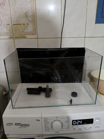 Small glass aquarium tank with filter parts — used, needs cleaning