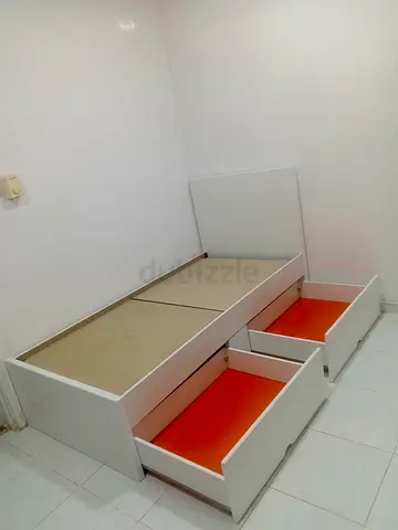 White single bed frame with large under-bed drawers - good condition
