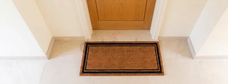 Used rectangular coir doormat - brown, good condition. Home center