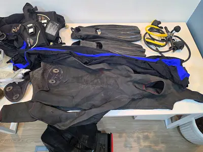Complete recreational scuba diving gear set — fins, BCD, regulator, wetsuit