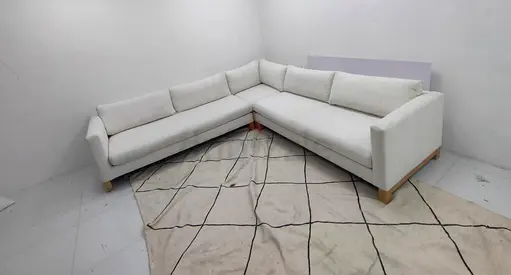 Crate and Barrel cream color corner sofa