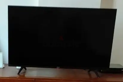 40-43 inch LED TV with table in good working condition