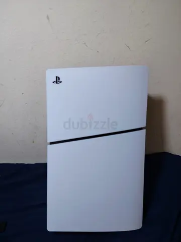 Sony PlayStation 5digital version - White with two controllers only 1 month old in warranty of 4 mon