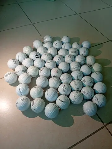 Used mixed set of around 60 golf balls - practice/tee balls