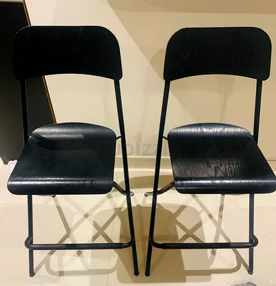 Pair of IKEA Franklin black wooden bar stools with metal frame