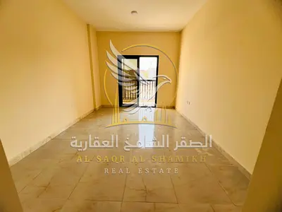 Brand-New 1-Bedroom Apartment for Annual Rent in Al Rifa’a Includes Balcony, 2 Bathrooms, and Unpav