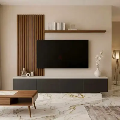 Modern wall-mounted entertainment unit with floating shelf