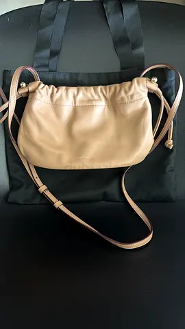 Strathberry charlotte drawstring bag in nappa leather