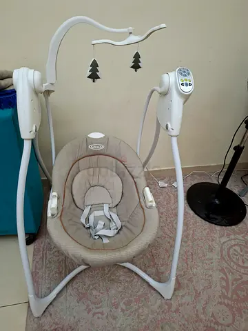 Graco electric baby swing - beige, good condition
