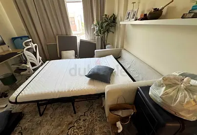 Beige fabric sofa bed with mattress - used, good condition