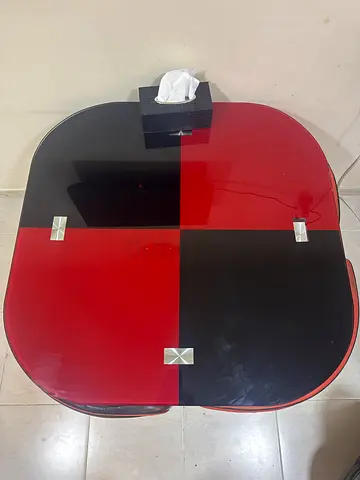 Modern red and black glass coffee table - square rounded design