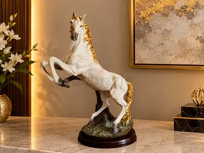 White and Gold Rearing Horse Statue on Wooden Base