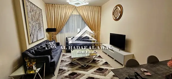 Available for monthly rent in Al Taawun: a one-bedroom apartment with a living room. Internet included only.