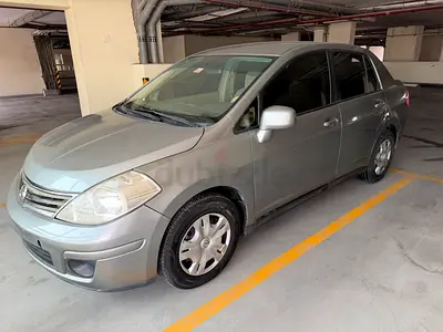 Nissan Tiida 2011 SE 1.6. 4 cylinder. GCC Specs. Full auto. All power window. LCD rev cam.