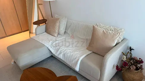 Light beige L-shaped sectional sofa with chaise - good condition