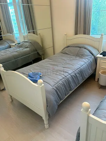Two Matching Pottery Barn Solid Hardwood Single Beds – White