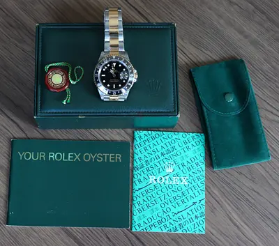 Rolex GMT-Master II 16713 Black & 18K Gold | 2001 P-Series | Box Set | mint condition