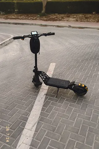 Used electric scooter - dual motor, foldable, good condition