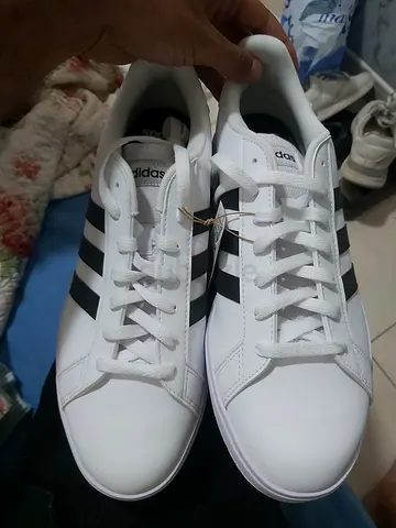 White Adidas sneakers with black stripes - new