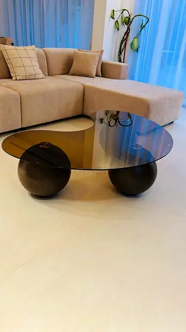 Modern glass coffee table with wooden color bases