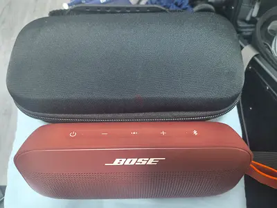 Bose SoundLink Flex Portable Speaker (Carmine Red) + Protective Travel Case