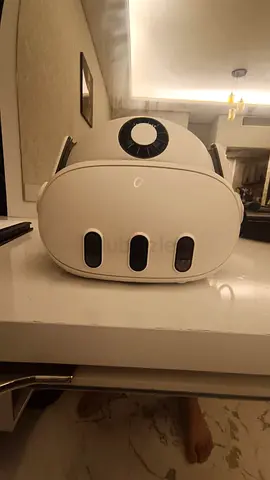 Used white VR headset with head strap — good condition