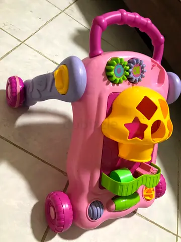 Pink multi-activity baby walker with shape sorter and gears
