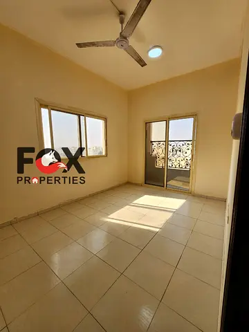 1-Bedroom Apartment for Annual Rent in Al Nuaimiya 2, Ajman | Separate Living Room | Open View