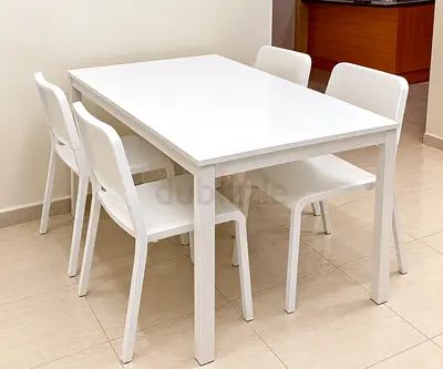 White dining table with 4 chairs - good condition