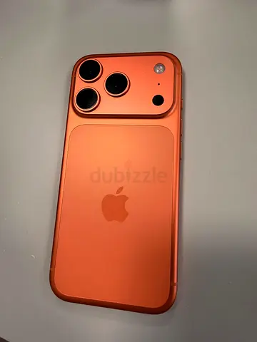 iPhone (orange color) - Good condition, unlocked
