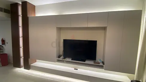 Custom made Built-in wall entertainment unit with TV niche and LED lighting