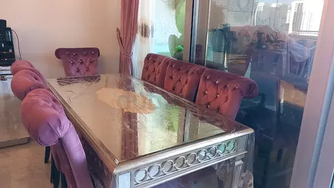 Dining table with 6 velvet tufted chairs - Excellent condition from The One