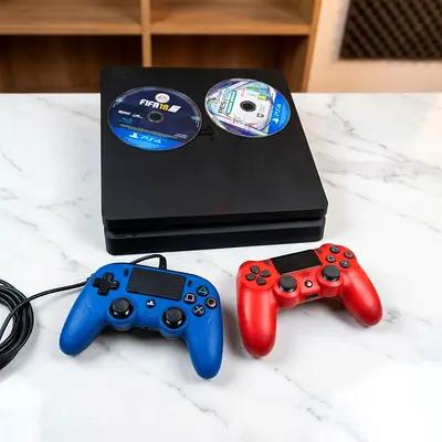 PS4 SILM 1TB TWO CONTROLLER +2 GAMES 14 .0 VERSION