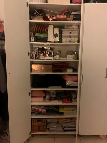 Two white cabinets