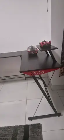 Small folding study desk with metal frame and shelf