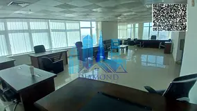 A large, furnished office is available for sale, including a parking space, located in the Horizon T