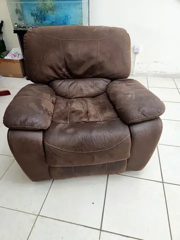 Brown leather single recliner armchair - used