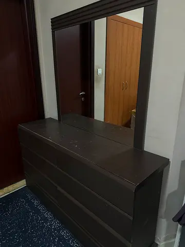 Dark wood dresser with mirror - good condition