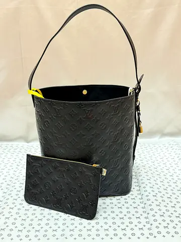 Black Louis Vuitton Monogram Embossed Leather Bucket Bag with Pouch