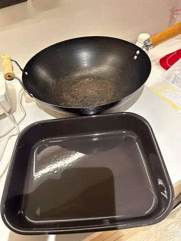 Used non-stick wok and roasting/baking tray set