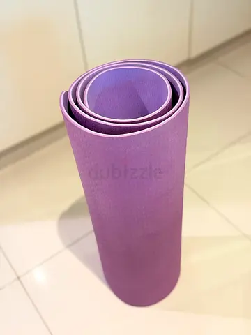 Good condition purple yoga mat - non-slip, lightweight