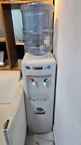Water Dispenser with 19L Bottle - Perfect Condition. Hot and cool.