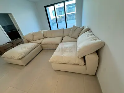 Marina Home lucious feather 🪶 filled modular sofa with footstool