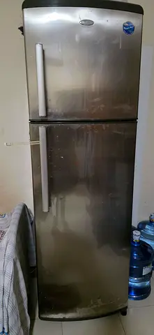 Used Double-Door Stainless Steel Refrigerator - Needs Minor Repair