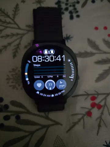 Used round smartwatch with nylon strap - working condition