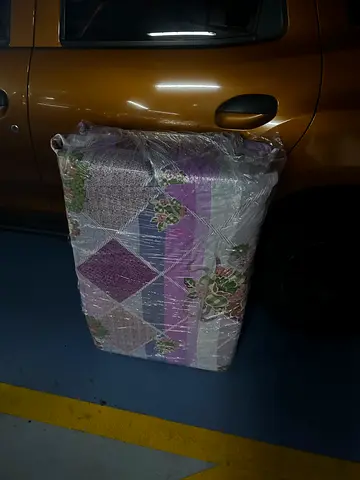Folding Single mattress wrapped in plastic - good condition