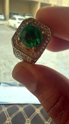 Men's statement ring with large green gemstone and pavé stones