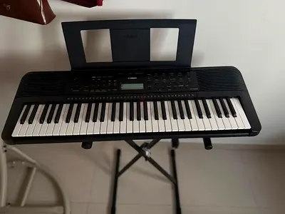 Yamaha portable keyboard with stand - good working condition