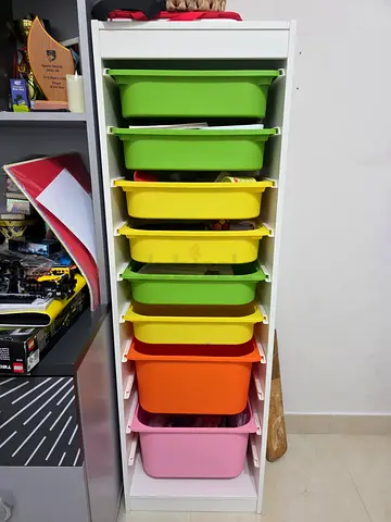 White storage organizer with 8 colorful pull-out bins - good condition